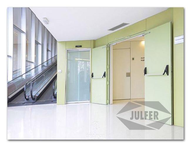 Puerta-Cortafuegos-Metalica-Pivotante-Ei-RF-barra-antipánico-2-hojas-doble-Turia-Julfer-Andreu